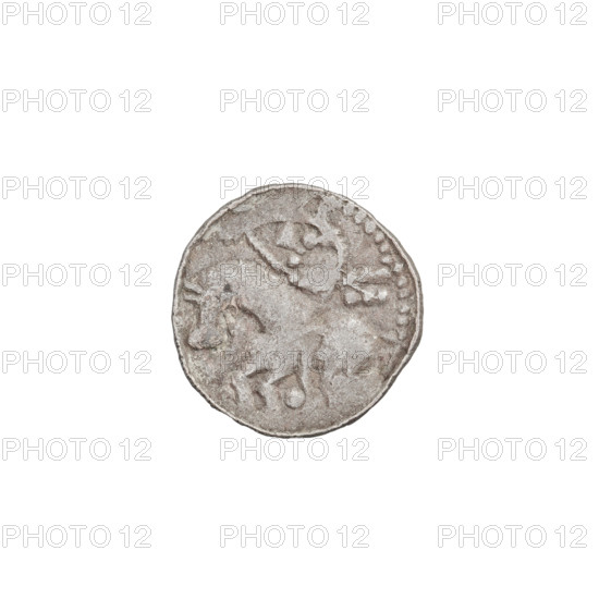 Denarius (princely type) of Boleslaw II the Bold (King of Poland; 1058–1079). Princely type depicting horses, spears, heads, shields. Obverse: head facing left with inscription around the rim. Reverse: horseman with spear and shield facing left; six points behind the rider, one point under the horse. Date: 1058–1076. Poland, Kraków. Coin; weight 0.52 g; axis 45°.