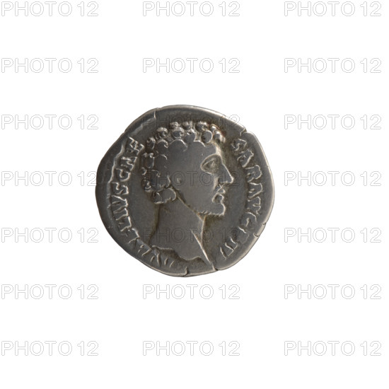 Denarius, Marcus Aurelius (121–180; Roman emperor 161–180), caesar 139–161; issuer: Antoninus Pius (86–161; Roman emperor 138–161). Obverse: Head of young Marcus Aurelius without a cap to the right, inscribed 'AVRELIVS CAE - SAR AVG PII'. Reverse: Minerva standing right, holding a spear in her raised right hand, resting her left hand on a shield standing on the ground, inscription 'T, POT III - COS II'. Iconography: Roman deities, Minerva, shields, spears. Date: 148–149. Roman Empire (27 BC–476). Medium: coin (denarius). Diameter: 17.5 mm. Weight: 2.95 g. Axis: 0°.