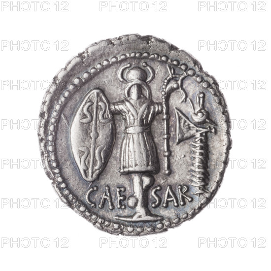 Denarius, Julius Caesar (100–44 BC; Roman dictator 49–44 BC). Obverse: woman's head in an oak wreath and diadem; behind her an inscription. Pearly border. Reverse: trophy with a Gallic shield and carnyx; on the right an axe; below the inscription CAESAR. Pearly border. Date: July 13, 48–47 BC. Roman Republic (505–27 BC). Coin; weight 3.92 g; axis 135 degrees. Makers noted: Protassowicki, Rafal (1894–1957). Subjects: Gallic trophy, wreaths, shields, axes, oak wreaths, women's heads, diadems, carnyxes.