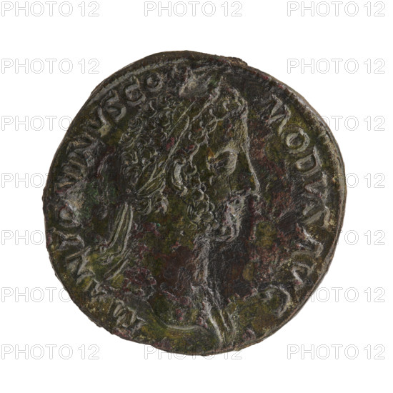 Sestertius, Commodus (161–192; Roman emperor 177–192), issuer. Obverse: Head of Commodus in a laurel wreath to the right, inscription 'M ANTONINVS COM·MODVS AVG' around. Reverse: Naked Mars walking to the right, holding a spear in his right hand and a trophy in his left, inscription 'TR P VII·IMP · II COS III PP' around, in SC fields. Date: 181–182. Roman Empire (27 BC–476). Rome. Coin. Diameter 31.0 mm. Weight 22.30 g. Axis 180 degrees. Subjects: Mars, spears, trophies; iconography of Commodus and Roman deities.