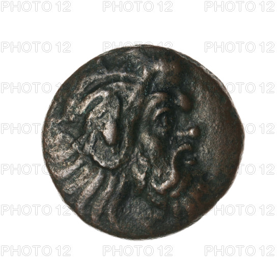 Bronze coin, Pantikapaion; protoma of a griffin (iconographic); head of a Satyr (iconographic); Black Sea; Satyr (mythology); griffins; fish; sturgeons. Obverse: head of a bearded Satyr without a wreath to the right. Reverse: protoma of an eagle-headed griffin to the left; at the bottom a sturgeon to the left; letters on the sides and top. Date: 330–315 BC. Region: Cimmerian Bosporus, Pantikapaion. Object type: coin. Weight: 4.80 g. Axis: 180°. Dimensions: 19.9 mm × 20.4 mm. Maker: Pantikapaion.