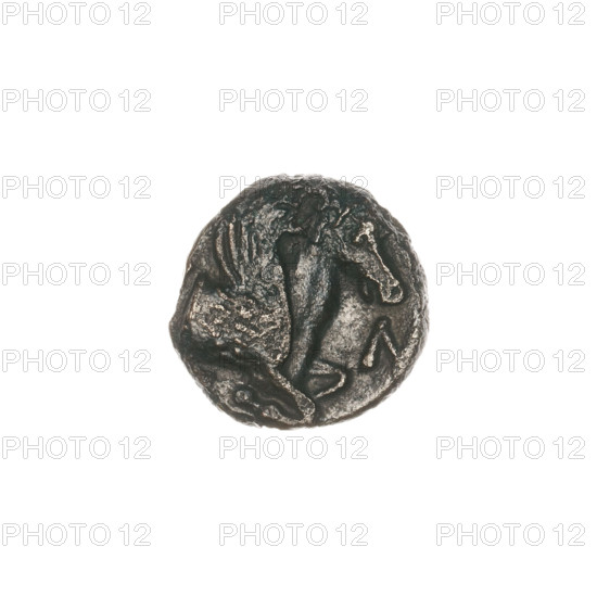 Bronze coin, Pantikapaion; obverse: head of beardless satyr facing right; reverse: protoma of Pegasus facing right with letters at the sides and top. Iconography: protoma of Pegasus, head of satyr. Mythology: Satyr, Pegasus. Date: 330–315 BC. Place: Cimmerian Bosporus, Pantikapaion. Medium: bronze. Weight: 2.49 g. Dimensions: 14.8 mm × 14.4 mm.