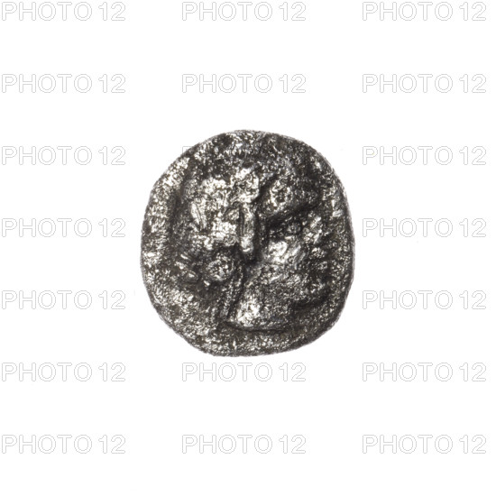Triobol, Pantikapaion; head of beardless Satyr in ivy wreath facing right; inverted: lion 'prostrate to the ground' facing right with head turned back; inscription (cut-off); Satyr (mythology), animals; 340–330 BC, Cimmerian Bosporus, Pantikapaion; coin; weight 2.15 g; axis 330°; dimensions 13.5 × 12.9 mm; maker/date: 340–330 BC.