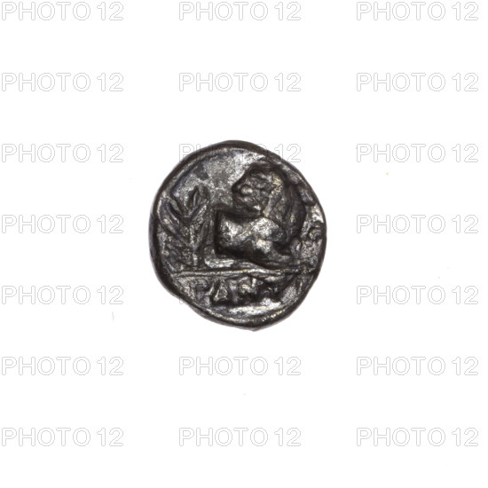 Obol, Pantikapaion; obverse: head of a beardless Satyr in a willow wreath facing right; reverse: lion protoma with head turned back facing right, laurel branch on the left, inscription in the cut. Iconography: Satyr's head, lion protoma, laurel branches. Satyr (mythology), lions, animals. Date: 340–330 BC. Place: Cimmerian Bosporus, Pantikapaion. Coin; weight 0.77 g; axis 120°; dimensions 9.2 mm × 9.6 mm.
