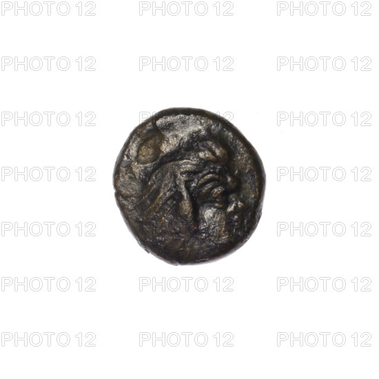 bronze coin, Pantikapaion; obverse: head of a beardless Satyr facing right; reverse: bull's head facing left with letters on the sides and above; iconography: Satyr, bull; region: Cimmerian Bosporus, Black Sea; date: 340–330 BC; material: bronze; weight: 1.40 g; dimensions: 11.5 mm and 11 mm