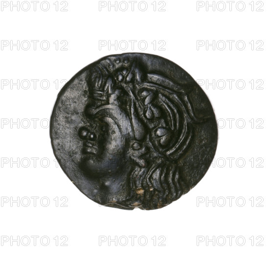 Bronze coin, Pantikapaion; obverse: head of a beardless Satyr in an ivy wreath facing left; reverse: lion's head to the left, below it a sturgeon to the left, letters at the top and sides. Iconography: Satyr's head, lion's head, Satyr (mythology), lions, animals, fish, sturgeons. Date: 315–300 BC. Region: Cimmerian Bosporus, Pantikapaion. Medium/function: coin. Weight: 6.35 g. Axis: 330°. Dimensions: 20 mm × 21.5 mm. Maker/date inscriptions: (no maker listed).