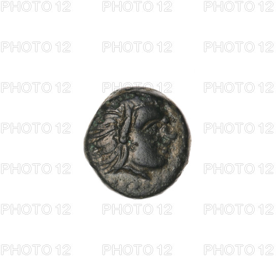 bronze coin, Pantikapaion, bow in quiver (iconographic), head of Satyr (iconographic), Satyr (mythology), bows (armed), weapons (iconographic), armament (iconographic), gorytos (armed); aw: head of beardless Satyr to the right, pearl rim; rw: bow in quiver to the right, inscription at the top and bottom; 330–315 BC, Cimmerian Bosporus, Pantikapaion; coin; weight 1.43 g; dimensions 11.9 × 11.3 mm