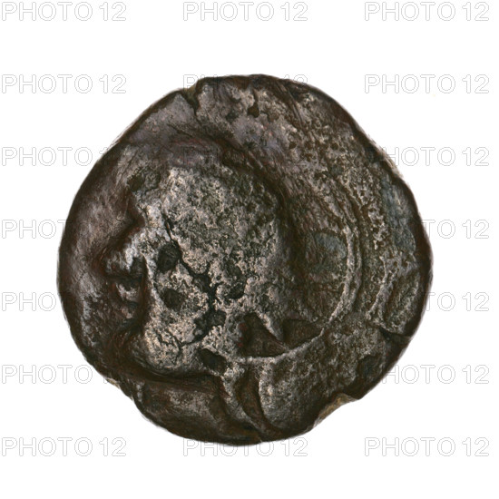 Bronze coin, Pantikapaion; obverse: head of a beardless Satyr in an ivy wreath facing left, with a twelve-pointed star countermark on it; reverse: lion head with open mouth facing left, sturgeon below facing left, letters on the sides and at the top, countermark on the head (arch in the quiver). Iconography: Satyr's head, lion's head, countermarks, bow in quiver, stars, fish (sturgeon), twelve-pointed star, gorytos, quivers, bows/weapons. Satyr (mythology), lions, animals. Beginning of the 3rd century BC; Cimmerian Bosporus, Pantikapaion. Coin; weight 6.32 g; axis 330°; diameters 21.4 mm and 21.6 mm.