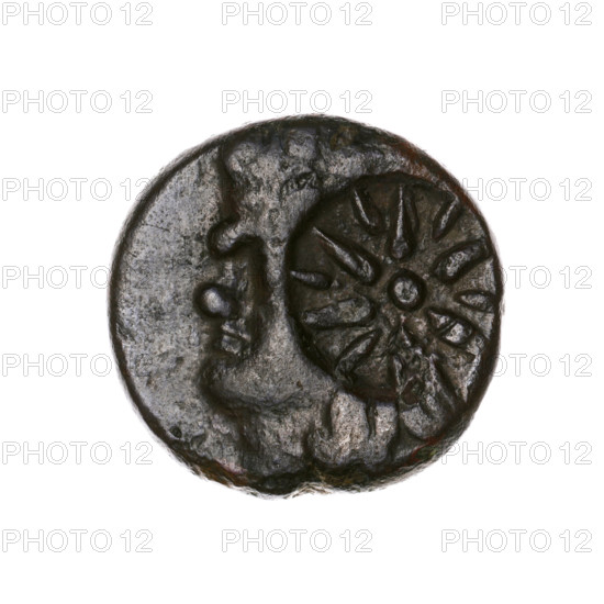 Bronze coin, Pantikapaion; obverse: head of a beardless satyr in an ivy wreath facing left, with a twelve-pointed countermark star; reverse: lion head with open mouth facing left, sturgeon below facing left, letters at sides and top, additional countermark (arch in quiver). Iconography: satyr's head, lion head, countermarks, bow in a quiver, stars, sturgeons; motifs include satyr (mythology), lions, fish, bows/quivers, gorytos. Early 3rd century BC, Cimmerian Bosporus (Pantikapaion). Coin; weight 6.22 g; axis 330°; dimensions 18.5 mm × 19 mm.