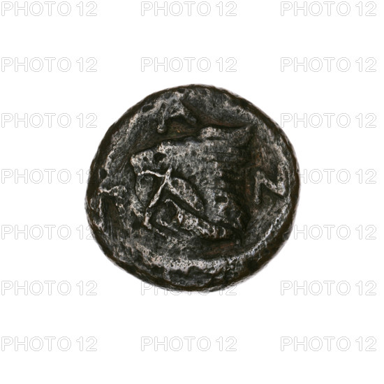 Bronze coin, Pantikapaion, beginning of 3rd century BC. Obverse: head of a beardless Satyr in an ivy wreath facing left, with a twelve-pointed star countermark on the head. Reverse: lion head with gaping mouth facing left; below, a sturgeon facing left; letters at the sides and top; bow-in-a-quiver countermark on the head. Iconography: Satyr, lions, sturgeons, fish, stars, bows and quivers, gorytos; themes include weapons/armament. Countermarks present. Weight 5.95 g; diameters 19.5 mm and 20.3 mm.