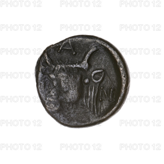 Bronze coin, Pantikapaion; obverse: head of bearded Satyr facing left; reverse: bull's head facing left with letters at sides and top; iconography: Satyr's head, bull's head; motifs: Satyr (mythology), bulls, animals; inscription: letters on sides and at the top; date: beginning of the 3rd century BC; region: Cimmerian Bosporus, Pantikapaion; weight: 4.14 g; dimensions: 16.1 mm and 16.4 mm; maker/attribution: Pantikapaion.