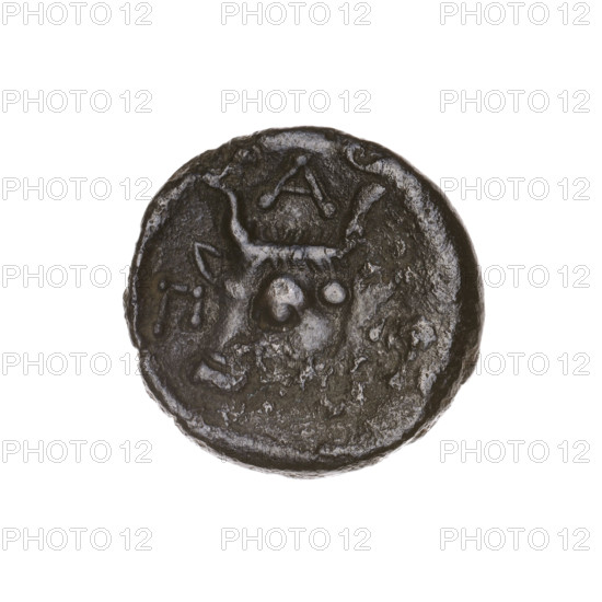 Bronze coin, Pantikapaion; obverse: head of a bearded Satyr to the left; reverse: bull's head to the left, letters on the sides and at the top; iconography: Satyr's head, bull's head; mythology: Satyr; animals: bulls; date: beginning of the 3rd century BC; region: Cimmerian Bosporus (Pantikapaion); find/association: Volhynia (southern); weight 4.10 g; axis 210°; dimensions: 17.1 mm × 17.2 mm.