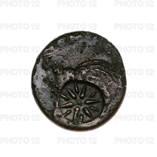 bronze coin, Pantikapaion; obverse: head of bearded Satyr in ivy wreath facing left, pierced and countermarked with twelve-pointed star on type of beardless Satyr to the left; reverse: bow and arrow to the right, inscription below, pierced on type of a lion's head and a sturgeon to the left, countermarked with a bow in a quiver; iconography: Satyr, bow and arrow, arrows, bows, weapons, gorytos, animals, sturgeons, fish, lion's head, lions, twelve-pointed star, stars, countermarks; 1st half of the 3rd century BC; Cimmerian Bosporus, Pantikapaion; coin; bronze; weight 6.38 g; diameters 21.6 mm and 20.5 mm