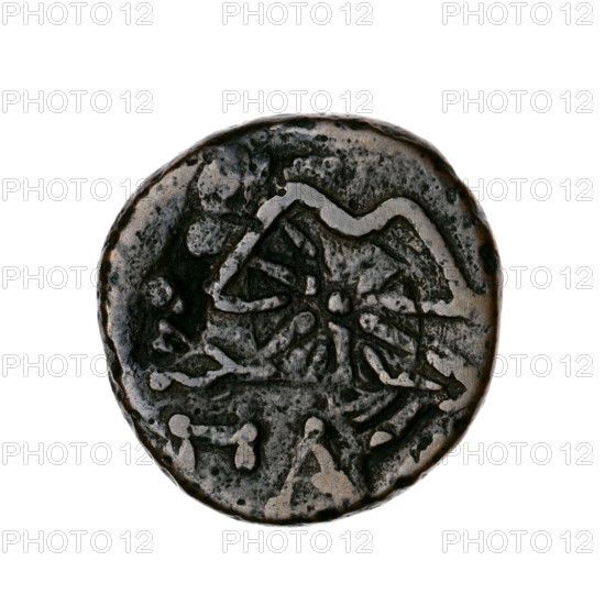 bronze coin, Pantikapaion; obverse: head of bearded Satyr in ivy wreath to the left, pierced on the type of lion and sturgeon to the left, countermarked with a bow in quiver; reverse: bow and arrow to the right, inscription below, pierced on type head of a beardless Satyr to the left, countermarked with a twelve-pointed star; iconography: Satyr, bow and arrow, arrows, bows, weapons, gorytos, animals, sturgeons, lion head, fish, twelve-pointed star, stars; countermarks; 1st half of the 3rd century BC; Cimmerian Bosporus, Pantikapaion; bronze coin; weight 6.33 g; diameters 19.3 mm and 19.5 mm