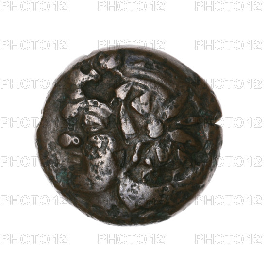 bronze coin, Pantikapaion; head of bearded Satyr in ivy wreath facing left, pierced on beardless type Satyr to the left, countermarked with a twelve-pointed star; reverse: bow and arrow to the right, inscription below, pierced on the type of lion and sturgeon head to the left, countermarked with a bow in a quiver; iconography: Satyr's head, bow and arrow, countermarks, stars, bow in quiver, gorytos, twelve-pointed star, sturgeons, lion's head, fish, lions; subject: Satyr (mythology); weapons: arrows, bows; material: bronze; date: 1st half of the 3rd century BC; region: Cimmerian Bosporus, Pantikapaion; coin; weight 5.10 g; axis 330°; dimensions: 19.6 mm × 20.5 mm.