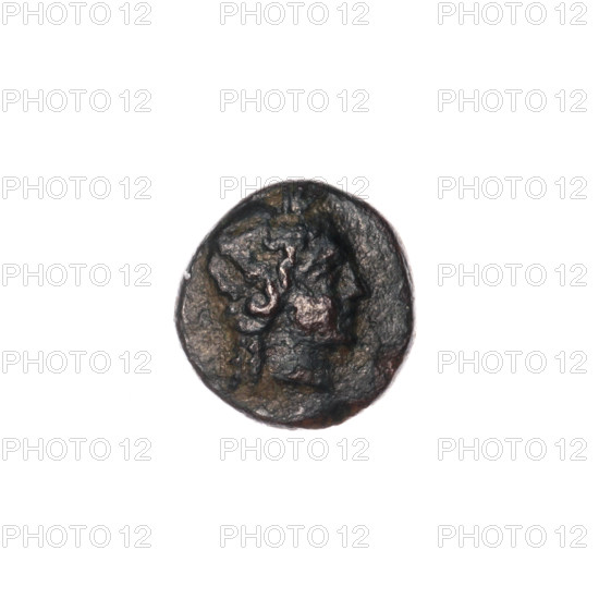 Bronze coin, Pantikapaion; obverse: head of Apollo to the right; ear of corn to the left; inscription below. Iconography: Apollo (mythology), plants. Date: 1st half of the 2nd–ca. mid-2nd century BC. Region: Cimmerian Bosporus, Pantikapaion. Material: bronze. Function: coin. Weight: 1.18 g. Dimensions: 11.2 mm × 10.8 mm.