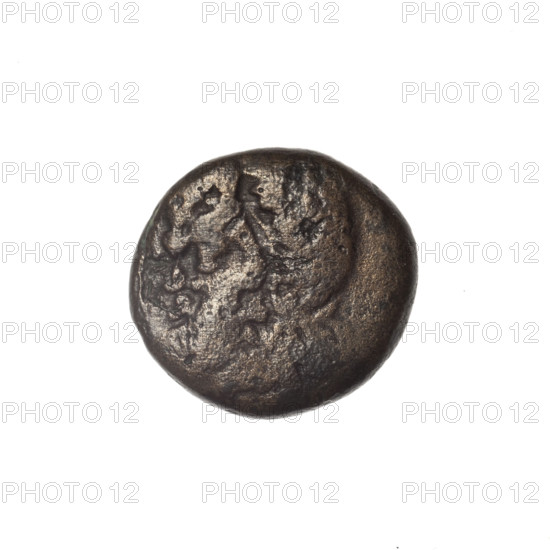 Bronze coin from Pantikapaion; obverse: head of bearded Satyr in ivy wreath facing left; reverse: cornucopia, Dioscuri caps topped with stars on the sides, inscription below; iconography: Dioscuri caps, Satyr's head, cornucopia; mythology: Satyr, Dioscuri; Black Sea region; 4th quarter of the 2nd century BC (Cimmerian Bosporus, Pantikapaion); weight 4.52 g; axis 30°; dimensions 16.8 × 18.1 mm.