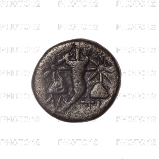 Bronze coin from Pantikapaion; obverse: head of bearded Satyr in ivy wreath facing left; reverse: cornucopia with Dioscuri caps topped with stars on the sides, inscription below. Iconography: Dioscuri caps, Satyr's head, cornucopia. Themes: Satyr (mythology), Dioscuri (mythology). Date: 4th quarter of the 2nd century BC. Place: Cimmerian Bosporus, Pantikapaion. Medium/function: coin. Weight: 4.52 g. Axis: 30 degrees. Dimensions: 16.8 mm × 18.1 mm. Restitution.