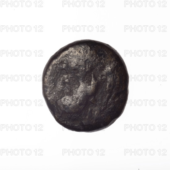 bronze coin, Pantikapaion; head of a bearded Satyr in an ivy wreath facing left (obverse); cornucopia, flanked by Dioscuri caps topped with stars, with an inscription below (reverse); iconography: Satyr, Dioscuri, cornucopia; 4th quarter of the 2nd century BC; Cimmerian Bosporus (Pantikapaion); coin; weight 4.10 g; dimensions 17.4 mm × 16.6 mm; maker/attribution: Pantikapaion.
