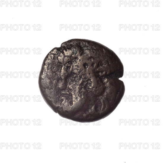 Bronze coin, Pantikapaion; obverse: head of bearded satyr in ivy wreath facing left; reverse: cornucopia, Dioscuri caps topped with stars on the sides, inscription below them; iconography: Dioscuri caps, Satyr's head, cornucopia; subject: Satyr (mythology), Dioscuri (mythology); date: 4th quarter of the 2nd century BC; region: Cimmerian Bosporus, Pantikapaion; weight: 4.07 g; dimensions: 17.8 mm × 17.5 mm; maker/attribution: Pantikapaion.
