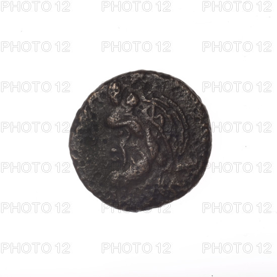 bronze coin, Pantikapaion; head of a bearded Satyr in an ivy wreath facing left (obverse); cornucopia with Dioscuri caps topped with stars and an inscription below them (reverse); iconography: Satyr, Dioscuri caps, cornucopia; 4th quarter of the 2nd century BC; Cimmerian Bosporus, Pantikapaion; coin; weight 3.42 g; axis 330°; dimensions 17.1 × 17.7 mm; maker/attribution: Pantikapaion.