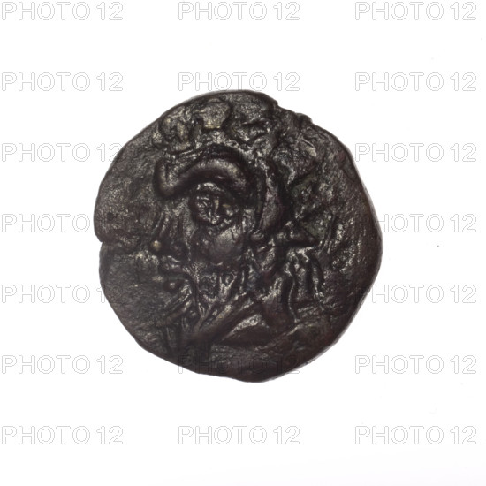 Bronze coin, Pantikapaion; obverse: head of bearded Satyr in ivy wreath facing left; cornucopia; on the sides Dioscuri caps topped with stars, inscription below them. Iconography: Satyr, Dioscuri caps, cornucopia. Style/subject: Black Sea, Cimmerian Bosporus, Pantikapaion. Maker/date: 4th quarter of the 2nd century BC. Materials/measurements: bronze; weight 3.35 g; dimensions 18.2 mm and 17.7 mm.