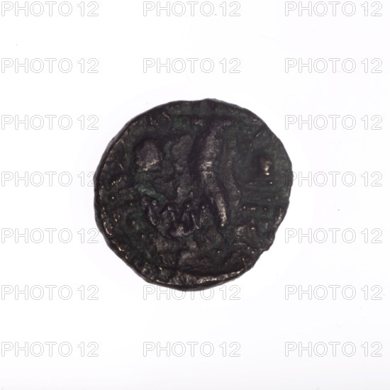 Bronze coin from Pantikapaion, 4th quarter of the 2nd century BC (Cimmerian Bosporus). Obverse: head of a bearded Satyr in an ivy wreath facing left. Reverse: cornucopia, Dioscuri caps topped with stars on the sides, inscription below. Iconography: Dioscuri caps, Satyr's head, cornucopia. Mythology: Satyr, Dioscuri. Weight 2.63 g; axis 330°; dimensions 17.1 × 16.3 mm.