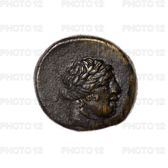 Bronze coin, Pantikapaion; obverse: head of Apollo in a laurel wreath to the right; reverse: tripod, behind it a thyrsus with ribbons diagonally to the right, monograms on left and right, inscription in two rows on the sides. Iconography: head of Apollo, thyrsus, tripod. Inscriptions/marks: monograms. Maker/attribution: Pantikapaion, Cimmerian Bosporus. Date: 1st quarter of the 1st century BC (95–65 BC). Material: bronze. Object type: coin. Weight: 8.80 g. Dimensions: 19.5 mm; 21.1 mm.