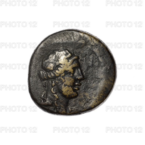 Bronze coin, Pantikapaion; obverse: head of Apollo in a laurel wreath facing right; reverse: tripod, behind it a thyrsus with ribbons diagonally to the right, monograms on left and right, and an inscription in two rows on the sides. Iconography: head of Apollo, tripod, thyrsus. Maker/Attribution: Pantikapaion, Cimmerian Bosporus. Date: 1st quarter of the 1st century BC (95–65 BC according to Frolov). Material: bronze. Weight: 8.15 g. Dimensions: 20.4 mm; 20.6 mm. Inscriptions/marks: monograms.