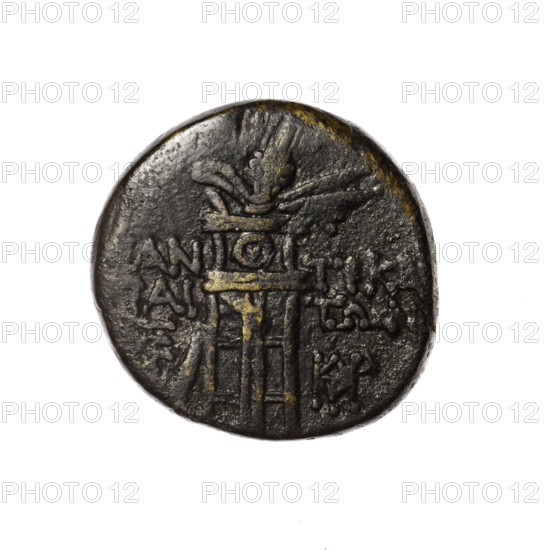 Bronze coin, Pantikapaion. Obverse: head of Apollo in a laurel wreath facing right. Reverse: tripod, behind it a thyrsus with ribbons diagonally right, monograms left and right, inscription in two rows on the sides. Iconographic subjects: head of Apollo, tripod, thyrsus. Monograms present. Date: 1st quarter of the 1st century BC (95–65 BC). Region: Cimmerian Bosporus, Pantikapaion. Weight: 8.15 g. Diameter: 20.4–20.6 mm. Maker/attribution: Terlecki, Ignatius (1860–1916) noted.
