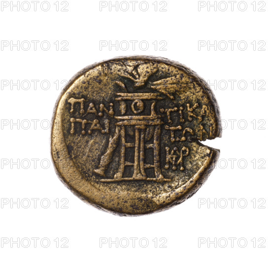 Bronze coin, Pantikapaion; obverse: head of Apollo in a laurel wreath right; reverse: tripod, behind it a thyrsus with ribbons diagonally right, monogram at right, inscription in two rows on the sides. Monograms. Apollo (mythology). 1st quarter of the 1st century BC (95–65 BC according to Frolov). Cimmerian Bosporus (Pantikapaion). Coin. Weight 8.12 g. Diameter 19.2–20.3 mm. Maker: Terlecki, Ignatius (1860–1916) noted.