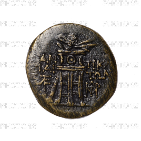 bronze coin, Pantikapaion; head of Apollo (iconographic) in a laurel wreath to the right (obverse); tripod, behind it a thyrsus with ribbons diagonally to the right, with a monogram on each side and an inscription in two rows on the sides (reverse); monograms; Apollo (mythology); 1st quarter of the 1st century BC (95–65 BC); Cimmerian Bosporus, Pantikapaion; coin; weight 6.98 g; dimensions: 23.2 mm × 21.6 mm.