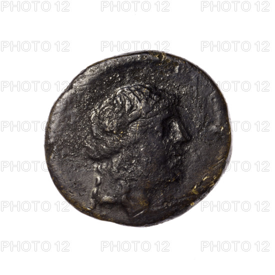 Bronze coin, Pantikapaion; obverse: head of Apollo in a laurel wreath to the right; reverse: tripod, behind it a thyrsus with ribbons diagonally to the right, monograms on left and right, inscription in two rows on the sides. Iconography: head of Apollo, tripod, thyrsus. Maker/date: 1st quarter of the 1st century BC (95–65 BC). Region: Cimmerian Bosporus, Pantikapaion. Material: bronze. Weight: 6.65 g. Dimensions: 20.9 mm and 22 mm. Inscriptions/marks: monograms.