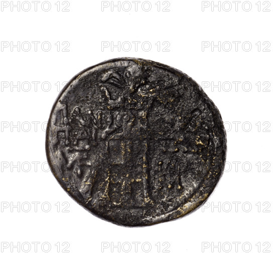 bronze coin, Pantikapaion; head of Apollo (iconographic); tripod (iconographic); thyrsus (iconographic); monograms; Black Sea; Apollo (mythology); aw: head of Apollo in a laurel wreath to the right; rw: tripod, behind it a thyrsus with ribbons diagonally to the right, on the left and right a monogram, an inscription in two rows on the sides; 1st quarter of the 1st century BC (95–65 BC according to Frolov 1999, 2002); Cimmerian Bosporus; Pantikapaion; coin; weight 6.65 g; diameter 20.9–22 mm