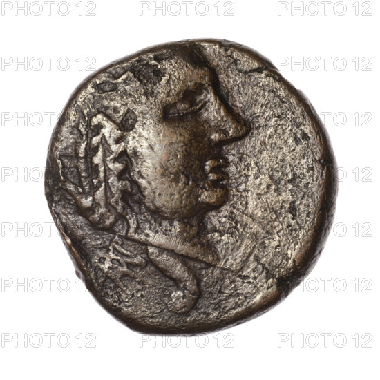 bronze coin, Pantikapaion; obverse: head of Apollo in a laurel wreath facing right; reverse: eagle with spread wings and head turned back standing on a thunderbolt 3/4 facing left, monogram in the left field, inscription at the bottom; iconography: eagles, eagle on a thunderbolt, head of Apollo; monograms; birds; Apollo (mythology); quivers (armed); Cimmerian Bosporus; after 63 BC; coin; weight 13.62 g; dimensions 26.2 mm × 25.9 mm