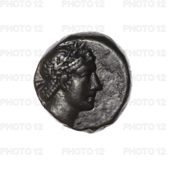 bronze coin, Pantikapaion; obverse: head of Apollo in a laurel wreath to the right; reverse: quiver with a strap on the left, bow on the right, inscription in two columns on the sides; iconography: Apollo (mythology), bows, quivers, armament, weapons; 2nd half 1st century BC; Cimmerian Bosporus, Pantikapaion; coin; weight 7.40 g; axis 30°; dimensions 19.4 × 19 mm