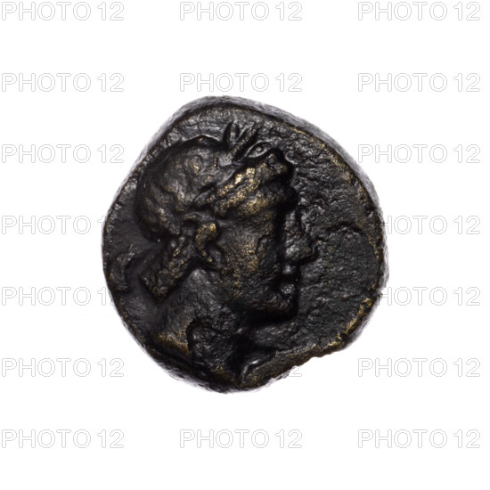 Bronze coin, Pantikapaion; obverse: head of Apollo in laurel wreath facing right; reverse: quiver with strap on the left, bow on the right, inscription in two columns on the sides; iconography: Apollo (mythology), quivers, bows, weapons, armament; 2nd half of the 1st century BC; Cimmerian Bosporus (Pantikapaion); coin; weight 6.87 g; dimensions 19.5 mm × 19.2 mm.