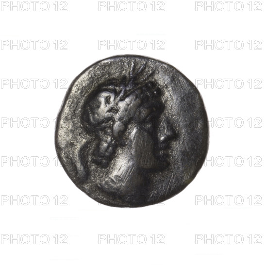 bronze coin, Pantikapaion; obverse: head of Apollo in laurel wreath facing right; reverse: quiver with strap on the left, bow on the right, inscription in two columns on the sides; iconography: Apollo (mythology), armament, weapon; 2nd half of the 1st century BC; Cimmerian Bosporus, Pantikapaion; coin; weight 5.74 g; dimensions 18.9 mm x 18.9 mm