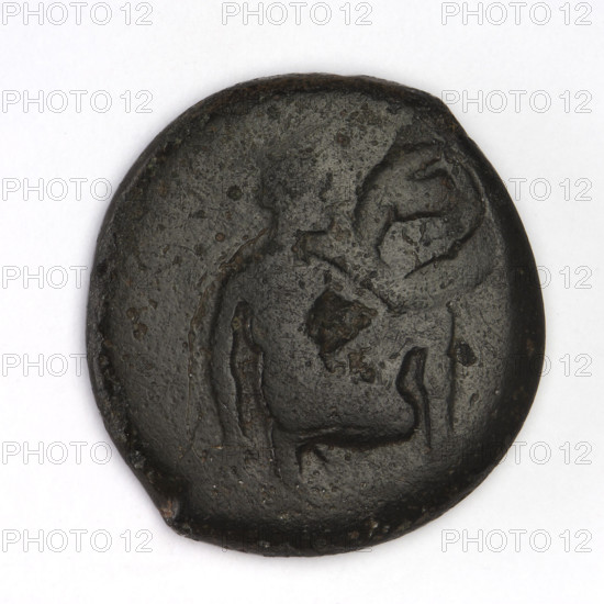 bronze coin, Chersonesos, griffins, kneeling Artemis, Artemis (mythology), dolphins, countermarks (numism), Black Sea, Artemis with bow and arrow, aw: Artemis (Deva) kneeling on right knee to the right, bow in left hand, countermark (dolphin); rw: eagle-headed griffin to the left, name of official at the top, XEP at the bottom; 320–310 BC, Chersonesos (Chersonesos Taurica), coin, weight 8.45 g, axis 90 degrees, diameter 22.3 mm × 21.1 mm