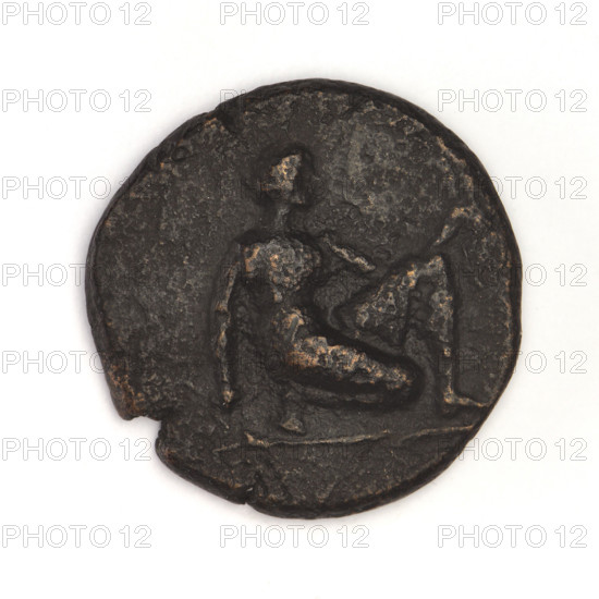 bronze coin, Chersonesos, griffins, kneeling Artemis, Artemis (mythology), Black Sea, Artemis with bow and arrow, Artemis (Deva) kneeling on right knee to the right, bow in left hand; reverse: eagle-headed griffin to the left, official's name at the top, XEP at the bottom; 320–310 BC, Chersonesos (Chersonesos Taurica), coin, weight 5.90 g, axis 120°, diameter ~20.4 × 20.2 mm, maker: Terlecki, Ignatius (1860–1916)