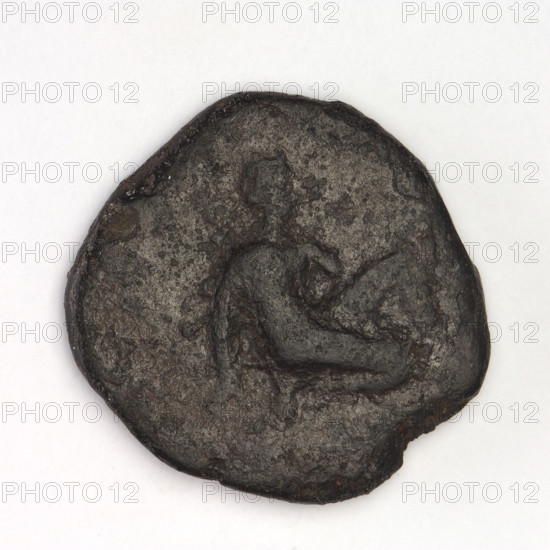bronze coin, Chersonesos; kneeling Artemis with bow and arrow (Artemis kneeling on right knee to the right, bow in left hand); reverse: eagle-headed griffin to the left, official's name at the top, XEP at the bottom; inscriptions: Artemis (mythology), Black Sea; dated 320–310 BC; Chersonesos Taurica; maker/date: 320–310 BC; coin; weight 6.38 g; axis 240°; dimensions: 21.3 mm and 20.7 mm