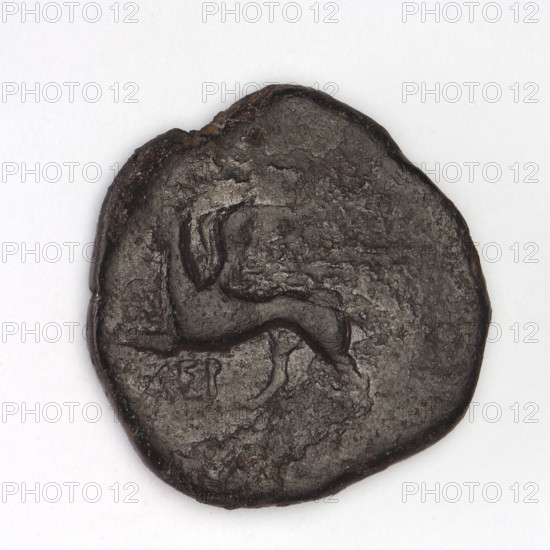 bronze coin, Chersonesos, griffins, kneeling Artemis, Artemis (mythology), Black Sea, Artemis with bow and arrow, Artemis (Deva) kneeling on right knee to the right, bow in left hand; reverse: eagle-headed griffin to the left, official's name at the top, XEP at the bottom; 320–310 BC, Chersonesos (Chersonesos Taurica), coin, weight 6.38 g, axis 240°, diameter 21.3 mm × 20.7 mm