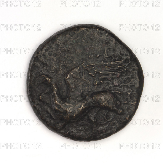 bronze coin, Chersonesos, griffins, Artemis kneeling, Black Sea, Artemis (mythology), Artemis with bow and arrow, eagle-headed griffin to the left, on the left XEP (beheaded); rev: Artemis (Deva) kneeling on right knee to the right, bow in left hand, official's name in the cut-off; 310–300 BC, Chersonesos Taurica, coin, weight 5.85 g, axis 180°, diameter 19.2 mm