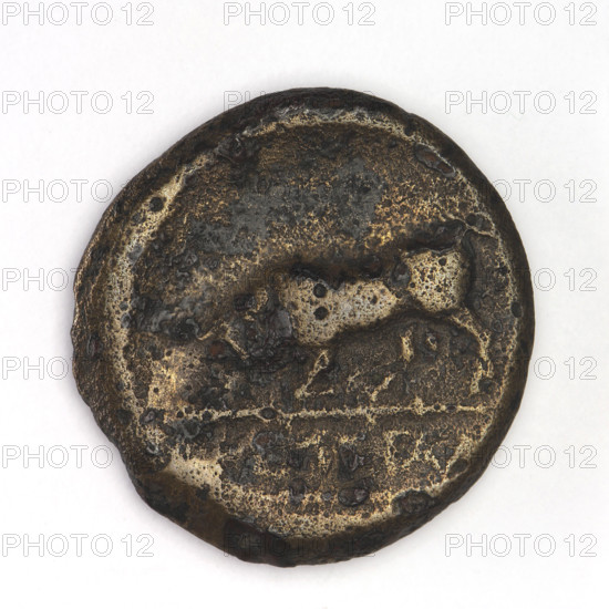 Bronze coin, Chersonesos Taurica, 300–290 BC. Obverse: Artemis (Deva) to the left thrusting a spear into a kneeling doe, bow in her left hand; bow and quiver depicted below; inscription 'XEP rw' at bottom. Reverse: bull on a club charging to the left, inscription below. Iconography: Artemis killing a doe; Artemis with a bow; weapons, armament, quivers, bows; animals (bull, doe). Weight 7.13 g; axis 180°; dimensions 21.8 mm × 21.1 mm.