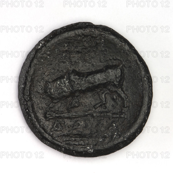 Bronze coin, Chersonesos (Chersonesos Taurica), 300–290 BC. Obverse: Artemis (Deva) facing left, thrusting a spear into a kneeling doe to the left, holding a bow in her left hand; inscription 'XEP' at the bottom. Reverse: a bull charging left onto a club, inscription below; below that a bow and a quiver. Iconography: Artemis, animals, weaponry (bows, quivers, clubs). Weight 5.90 g; axis 60°; diameters 21.6 mm and 21.7 mm. Makers/attribution: Ignatius Terlecki (1860–1916) [name mentioned].