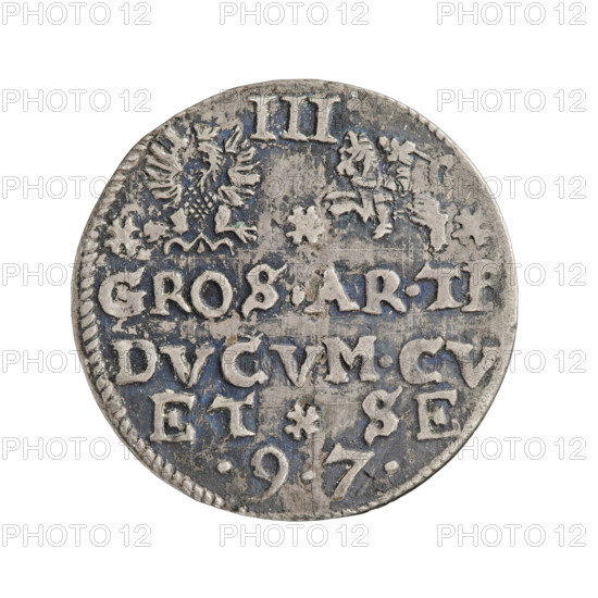 Trojak (with a bust of Frederick Kettler). Obverse: male bust with a beard facing right, in armor decorated with a ruff, separating the rim inscription; words separated by rosettes 'MO ARG DVCVM CVR'. Border: an eagle and a chaser with rosettes between them; above the value numeral 'III'. Below, an inscription in four lines, the third line separated by a rosette 'GROS.AR.TR/DVCVM.CV/.ET - SE./.9.7.' Date: 1597. Maker/publisher: Pipenstock, Krzysztof (fl. 1569–1600). Subjects and iconography: Frederick Kettler (Duke of Courland and Semigallia; 1587–1642), Wilhelm Kettler (Duke of Courland and Semigallia; 1587–1616); emblems of the Kettlers; White Eagle (coat of arms); Pogon (coat of arms); princely busts and male portraits (busts in armor and ruff) facing right. Type: coin (trojak), Duchy of Courland and Semigallia, Mitawa. Weight: 2.33 g. Axis: 90°.