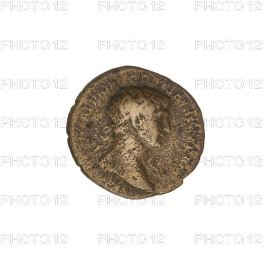 Semis, Trajan (53–117; Roman emperor 98–117). Obverse: head of Trajan in a radiant crown facing right; rim inscription illegible. Reverse: letters 'SC' surrounded by an oak wreath; rim inscription illegible. Oak and laurel wreath motifs. Coin minted in Rome but sent for circulation in the East (mainly Syria); probably not minted in Antioch because it has an axis of 180° rather than 0°. Date: 112–117. Roman Empire (27 BC–476). Material: coin. Weight: 3.39 g.