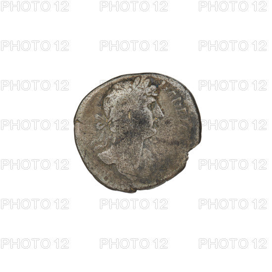 Denarius of Hadrian (76–138; Roman emperor 117–138). Obverse: Bust of Hadrian with laurel wreath facing right; rim inscription: HADRIAN. Reverse: Roma seated left on a chair, wearing a long robe and helmet, holding a figure of Victoria in her outstretched right hand, a vertical spear in her left, a shield behind her; rim inscription: P COS III. Date: 119–122. Roman Empire (27 BC–476). Rome. Coin; weight 2.64 g.
