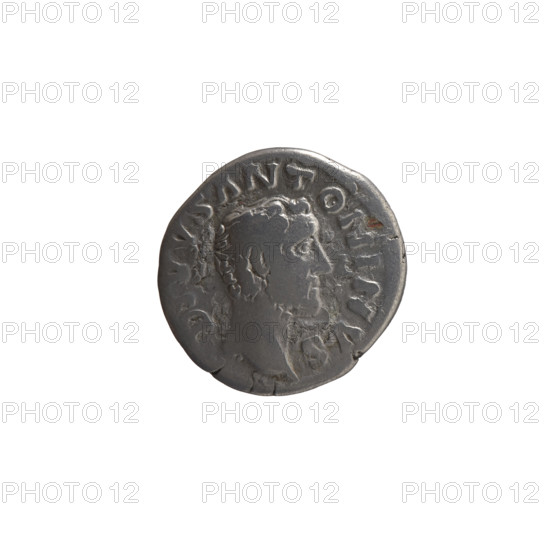 Denarius, after 161 CE. Obverse: Head of Antoninus Pius without a covering facing right, inscription DIVVS ANTONINVS. Reverse: Funeral pyre with four tiers, decorated with garlands and statues, with a quadriga on top, inscriptions CO, ECR, TIO. Issuers: Lucius Verus (130–169; Roman emperor 161–169) and Marcus Aurelius (121–180; Roman emperor 161–180); Antoninus Pius (86–161; Roman emperor 138–161) depicted posthumously. Iconography: Antoninus Pius, garlands, statues, funeral pyre. Roman Empire, Rome. Coin: silver denarius; diameter 18.0 mm; weight 2.89 g; axis 180°.