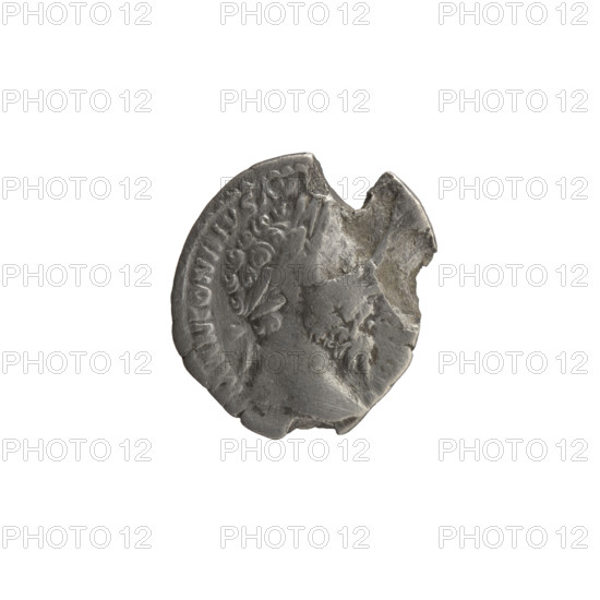 Denarius (with a hole), Marcus Aurelius (121–180; Roman emperor 161–180), issuer: Marcus Aurelius; obverse: head of Marcus Aurelius with laurel wreath facing right, legend 'M ANTONINVS' all around; reverse: Roma seated left, holding two shields in her right hand and a scepter in her left, legend 'S - III' all around; iconography includes Roman deities, personifications, sceptres, Roma (personification), shields; dated 169–170; Roman Empire (27 BC–476); Rome; coin; diameter 16.0 mm and 18.5 mm; weight 2.70 g; axis 0 degrees.